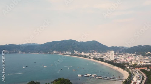 Aerial view beautiful Patong Beach in Phuket Thailand, Landscape of patong city phuket in sunny summer day time, Beautiful tropical sea,High angle view Sea beach Sunset in the evening