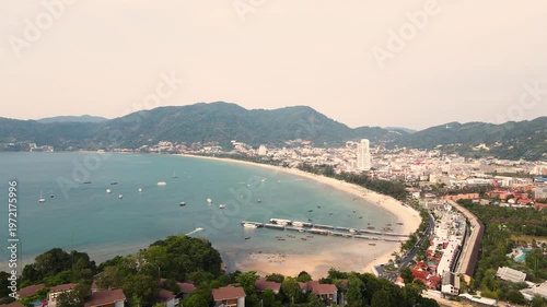 Aerial view beautiful Patong Beach in Phuket Thailand, Landscape of patong city phuket in sunny summer day time, Beautiful tropical sea,High angle view Sea beach Sunset in the evening