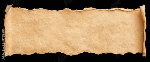 Aged ripped beige parchment evokes nostalgia with its weathered tan texture and torn edges