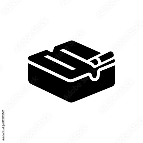 A black silhouette depicts an open book with pages lying flat and slightly askew silhouette