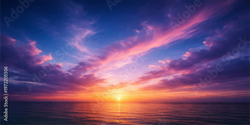 Beautiful sunset over the sea and ocean with colorful sky clouds and warm evening light reflecting on water
