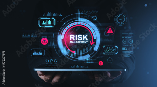 Photography Digital risk management dashboard interface with glowing analytics elements and warning symbols displayed on a dark tech background illustrating protection concept