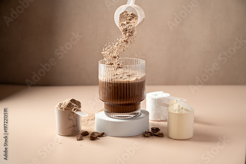 Chocolate protein powder pouring in a glass. Food supplement, fitness sport, health and nutrition.