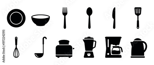 Collection of various kitchen utensils and modern electric appliances for cooking and dining in a home setting.
