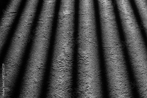 Quadro em tela The reflection of a steel cage on the rough concrete floor