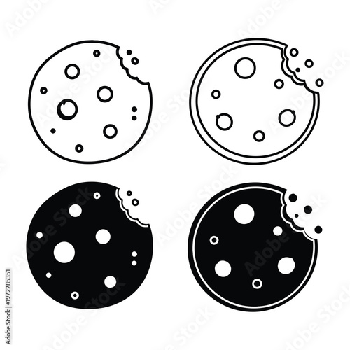 Four black and white chocolate chip cookies with bites taken