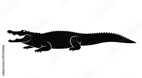 Black silhouette of a crocodile reptile with open mouth on white background