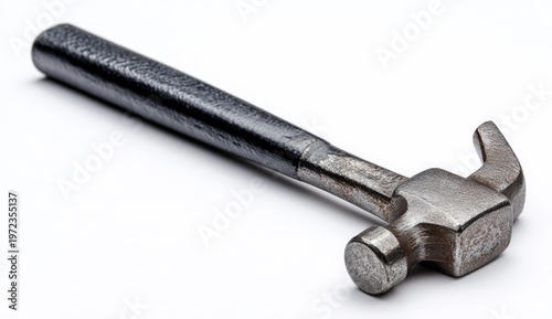 A sturdy metal claw hammer with a dark handle lies on a white background.