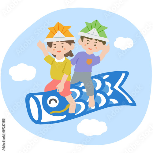鯉のぼりに乗って空を飛ぶ男の子と女の子
