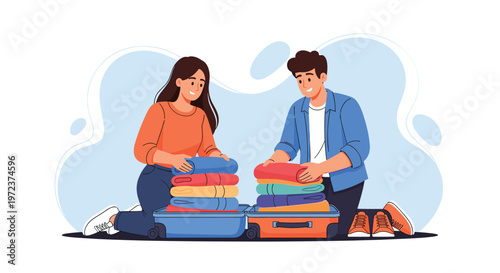 Happy young couple kneeling on the floor and packing colorful clothes into suitcases for their upcoming travel adventure.