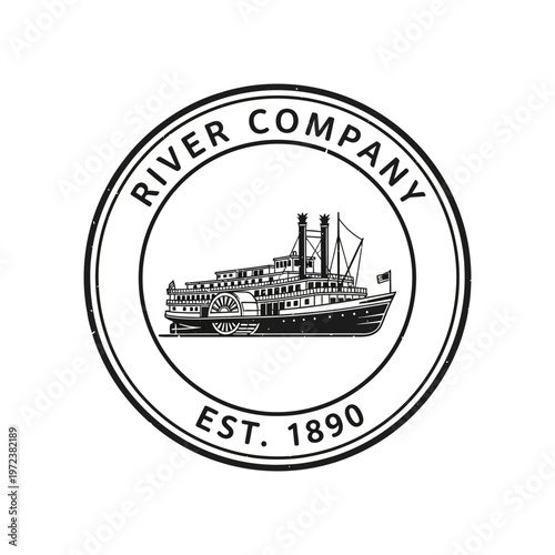 A vintage black and white circular logo featuring a steamboat illustration with the text "RIVER COMPANY EST. 1890" around it.