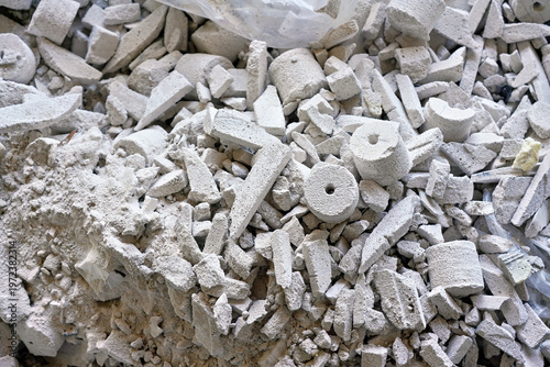 Fotografie Construction site waste debris - remains of white aac - autoclaved aerated concr