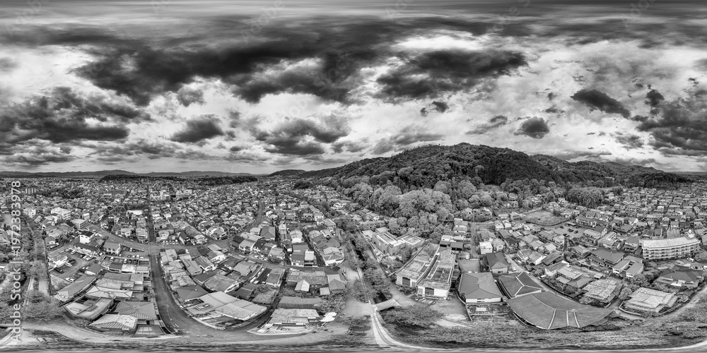 Fototapeta premium Full drone panorama of Kyoto from Philosopher’s Path, highlighting historic streets, river views, and urban landscape