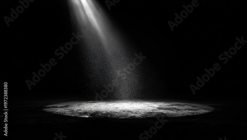Dramatic Spotlight Beam Illuminating a Dusty Stage Floor.