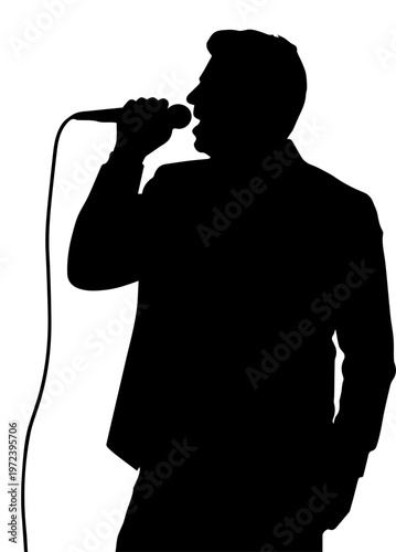 Silhouette of a male singer performing with a handheld microphone on white background