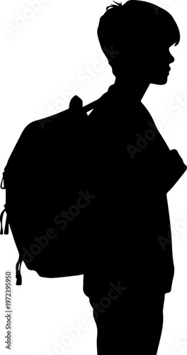 Silhouette of a schoolboy carrying a large backpack on his back