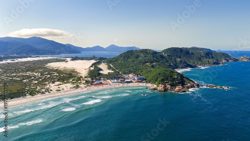Cuadro en lienzo Lateral aerial view of Joaquina Beach with extensive white sand, dunes and urban area, Florianopolis