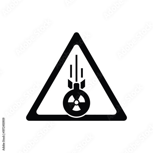 A black triangular warning sign depicts a falling bomb with a radioactive hazard symbol inside high quality