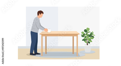 Man cleaning table in a bright room with a plant