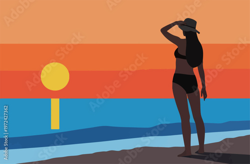 Person stands on the beach looking at the sunset while wearing a hat and swimsuit near the water at dusk