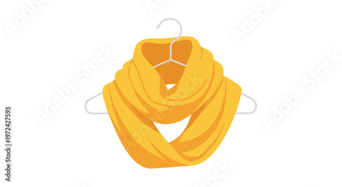 A cozy mustard yellow knitted infinity scarf hangs gracefully from a minimalist white wire hanger against a bright and clean neutral studio background space.