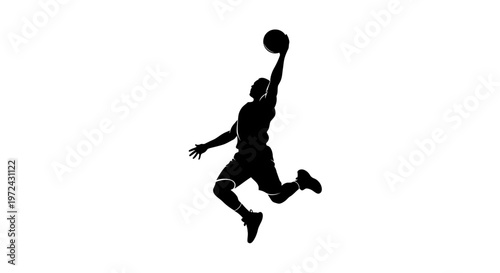 Man jumping to hit a basketball.