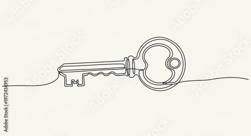 Old metal key on surface.