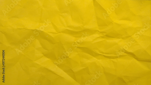 Yellow texture kraft paper, recycled cardstock. Old crumpled recycled paper close-up of old crumpled recycled paper