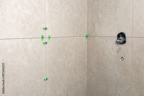 Recently laid on porcelain tiles on the wall in the bathroom
