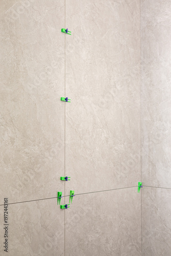 Recently laid on porcelain tiles on the wall in the bathroom 