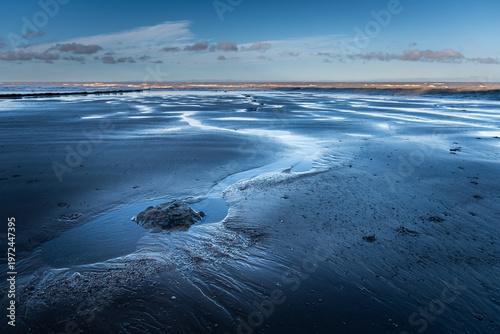 Stream leading to the ocean at St Audries Bay, Somerset Uk