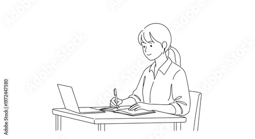 A woman sits at a desk working on a laptop and writing notes