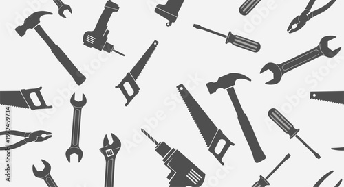 Seamless pattern featuring a scattered arrangement of workshop tools silhouettes in a uniform grey color on a clean light grey background.