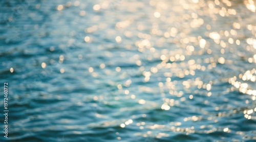 Sparkling water surface, sun reflections, serene and bright.