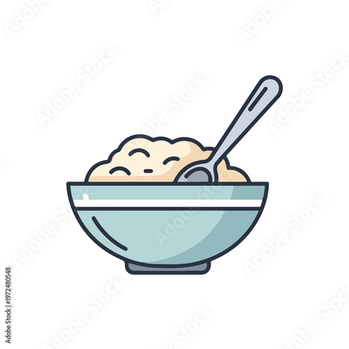 A bowl of oatmeal with spoon.