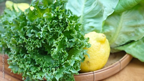 Obraz na płótnie Lemon and green salad vegetable.
