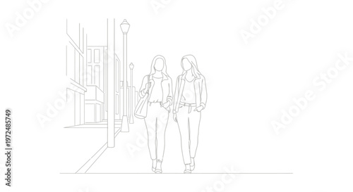 Two young women walking together on a city street.