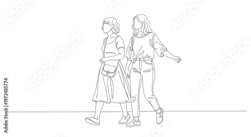 Two young women walking together side by side.