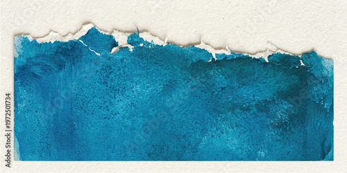 Rectangular piece of blue watercolor painted paper with a rough torn edge against a plain white background