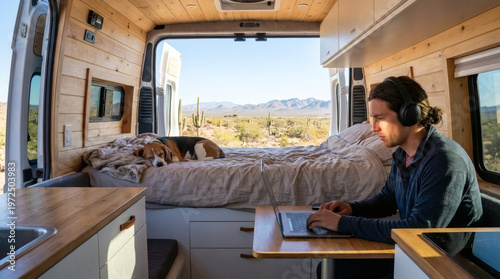 Freelancer Working in Camper Van with a Sleepy Beagle