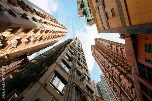 Wallpaper Mural Low angle view of high-rise residential towers with crowded narrow apartments in a community near Central-Mid-Levels Escalator & Walkway system in Hong Kong, a phenomenon of severe housing shortage Torontodigital.ca