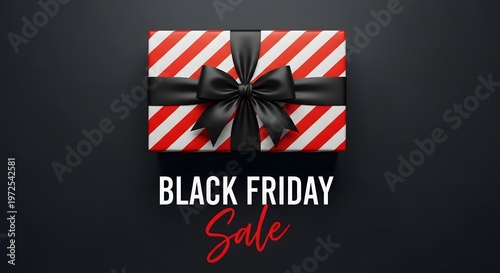 Black friday sale gift box with red and white stripes and black bow