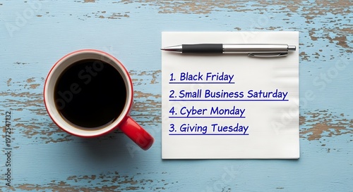 Coffee and holiday shopping list on wooden table with black friday with red cup