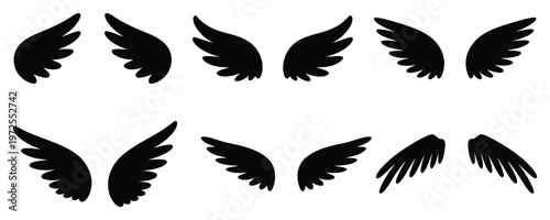 Collection of black silhouette angel wings on white background for design