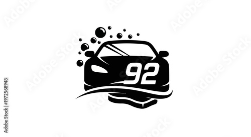 A sleek black sports car with the number 92 prominently displayed on its windshield, surrounded by bubbles and a stylized wave, suggesting a car wash or detailing service.