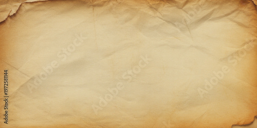Old crumpled parchment paper background with torn edges vintage texture for creative projects and historical documents or antique manuscripts.