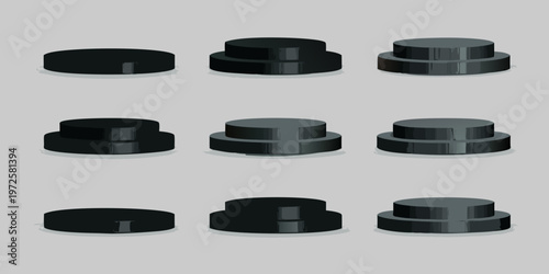 Black cylindrical platforms in varying stacked arrangements product display