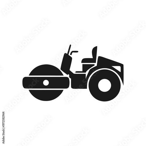 Black and white of a tractor with large rear wheels farm equipment agriculture