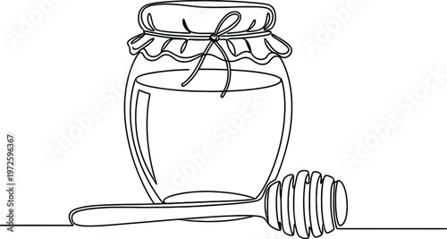 A person sitting on the ground with legs extended holding a cup