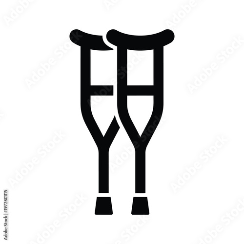 A pair of traditional black crutches against a plain background